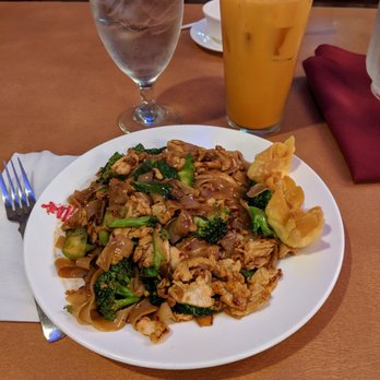 Thai Place - Chicken Pad See Ew with Thai iced tea (lunch). Delish! - Thai Near Me - Overland Park, Kansas