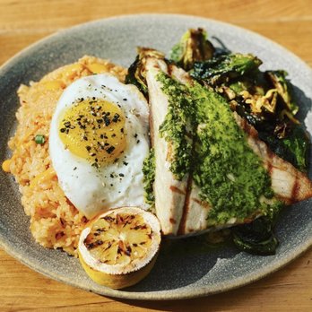 Pacific Catch - Kimchi Fried Rice w/Sunnyside Egg, Kampachu fish with chimichurri and brussel sprouts. - Seafood Near Me - San Mateo, California Pacific Catch - Kimchi Fried Rice w/Sunnyside Egg, Kampachu fish with chimichurri and brussel sprouts. - Seafood Near Me - San Mateo, California