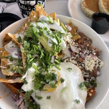 Yummies Bistro - Chilaquiles with egg - Breakfast & Brunch Near Me - South Padre Island, Texas Yummies Bistro - Chilaquiles with egg - Breakfast & Brunch Near Me - South Padre Island, Texas