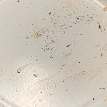 Blaze Pizza - Grainy black debris on bottom of crust. Dirty ovens? - Salad Near Me - Atlanta, Georgia