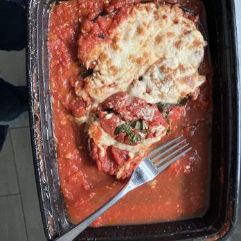 Lo Coco's - Eggplant Parmesan, my leftover that I'm about to reheat. The reference fork is for comparison. - Italian Near Me - Oakland, California