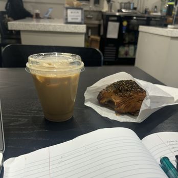 Cyclops Coffee - Iced vanilla latte (12 oz) and ham & cheese croissant. - Coffee & Tea Near Me - Long Beach, California Cyclops Coffee - Iced vanilla latte (12 oz) and ham & cheese croissant. - Coffee & Tea Near Me - Long Beach, California