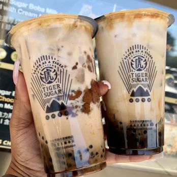 Tiger Sugar - Brown Sugar Boba + Pearl + Chocolate Malt with Cream Mousse (Left) and Brown Sugar Boba Milk + Pearl + Tiger Jelly + Cream Mouse (Right) - Bubble Tea Near Me - Ellicott City, Maryland