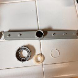 Advanced Appliance Repair - Broken upper/mid spray arm of my dishwasher.
