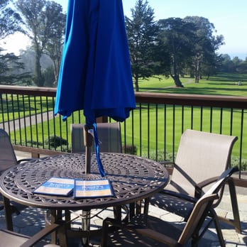 Bogey's Bar and Gril - a table with a blue umbrella - Bars Near Me - Aptos, California Bogey's Bar and Gril - a table with a blue umbrella - Bars Near Me - Aptos, California