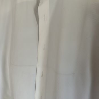 Sparklizing Cleaners - How a new shirt was returned after we took it in for pressing. - Dry Cleaning Near Me - Fremont, California