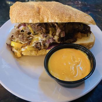 Clem’s Station - A Philly Cheesesteak packed with flavor and some "Boom Boom" sauce? It Booms! - Bars Near Me - San Diego, California