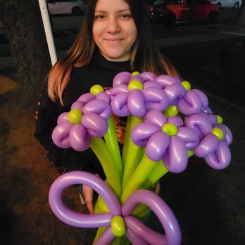 The Kids Corner - Book him for your next party! Makes the cutest creations! Look how awesome this flower bouquet is - Face Painting Near Me