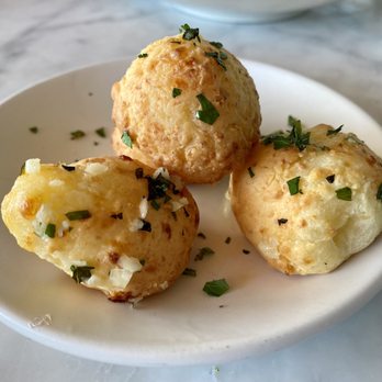 Dosalas - Brazilian Cheese Bread ($8 - 4 pieces) with Parmesan, Garlic Butter, and Fresh Herbs - Dosalas - Latin American Near Me - Vancouver, Washington Dosalas - Brazilian Cheese Bread ($8 - 4 pieces) with Parmesan, Garlic Butter, and Fresh Herbs - Dosalas - Latin American Near Me - Vancouver, Washington