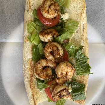 Cafe Desoto - Blackend Shrimp Po Boy. The bread is Leidenheimer and it comes with mayo, lettuce, tomato, and pickles. - American Near Me - Alexandria, Louisiana Cafe Desoto - Blackend Shrimp Po Boy. The bread is Leidenheimer and it comes with mayo, lettuce, tomato, and pickles. - American Near Me - Alexandria, Louisiana