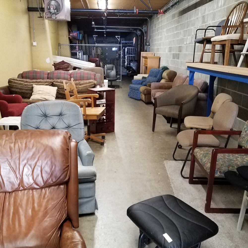 Lots of chairs and miscellaneous items in their new "bargain room".