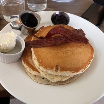 Tinys No 5 - Pancake with bacon (side of butter, syrup, jam) - New American Near Me - West University Place, Texas Tinys No 5 - Pancake with bacon (side of butter, syrup, jam) - New American Near Me - West University Place, Texas