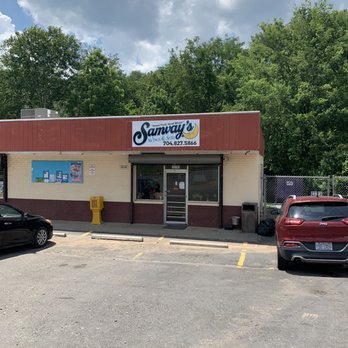 Samvay's Wings & Subs - two cars parked in a parking lot - Chicken Wings Near Me - Mount Holly, North Carolina Samvay's Wings & Subs - two cars parked in a parking lot - Chicken Wings Near Me - Mount Holly, North Carolina