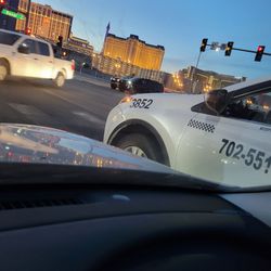 Yellow Checker Star - This guy was driving a fare, 2 guys weaving in and out of traffic and almost clipped my front end no wonder they have 1.7 Stars