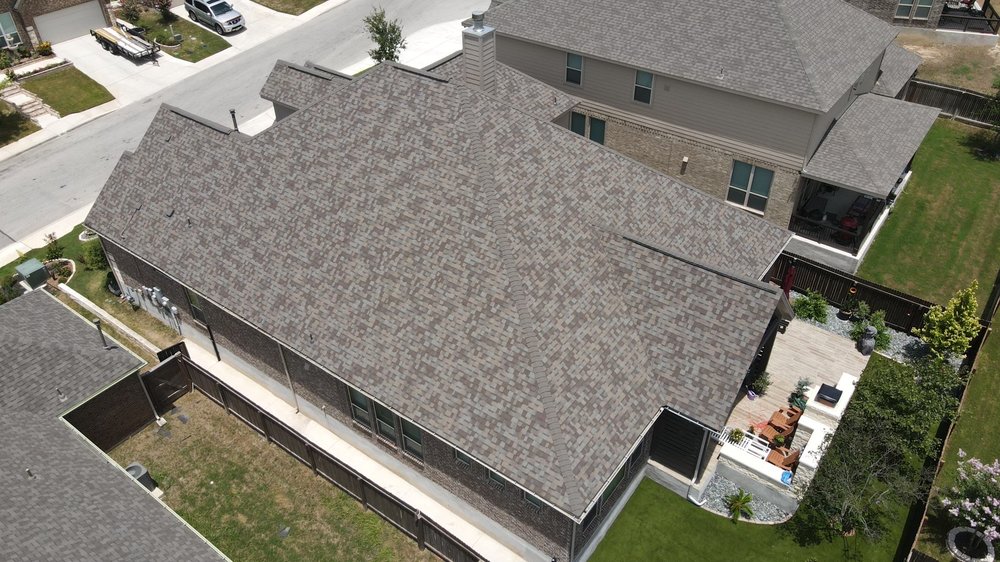 Slide of Monumental Roofing Services