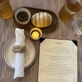 Chortke - Table setting menu and bread - Persian/Iranian Near Me - Rochester, New York Chortke - Table setting menu and bread - Persian/Iranian Near Me - Rochester, New York