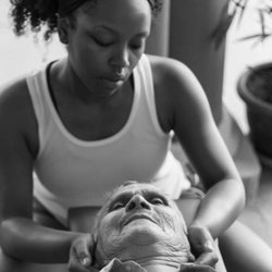 Amethyst Chiropractic - Dr. Ashley McElroy adjusting an elderly patient.