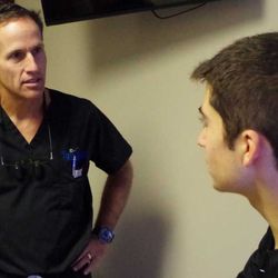Aspire Allergy & Sinus - Dr. Thompson going over allergy drops with a patient.