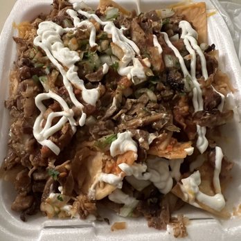 Tacos los Potrillos - Pastor nachos, I requested it with some Spanish rice, yum! Very generous portion - Tacos Near Me - West Covina, California