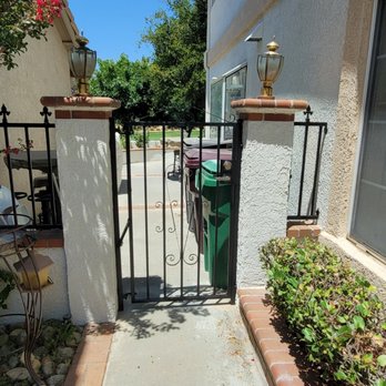 LC Custom Painting - Luis painted the black iron gate, also. Now we want new light fixtures on the gate posts! - Painters Near Me LC Custom Painting - Luis painted the black iron gate, also. Now we want new light fixtures on the gate posts! - Painters Near Me