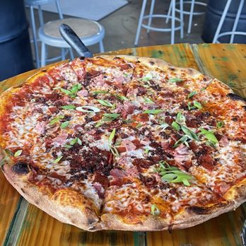 Red Tractor Pizza - Carnivore with spicy sauce. - Pizza Near Me - Bozeman, Montana