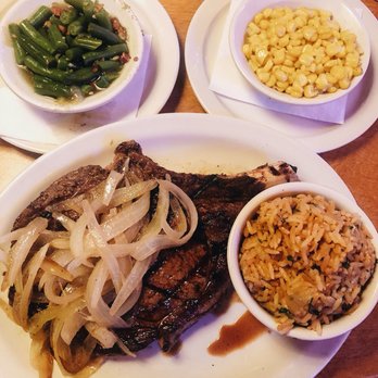 Texas Roadhouse - 20oz ribeye w/ dirty rice, butter corn, and green beans - Steakhouses Near Me - Katy, Texas Texas Roadhouse - 20oz ribeye w/ dirty rice, butter corn, and green beans - Steakhouses Near Me - Katy, Texas