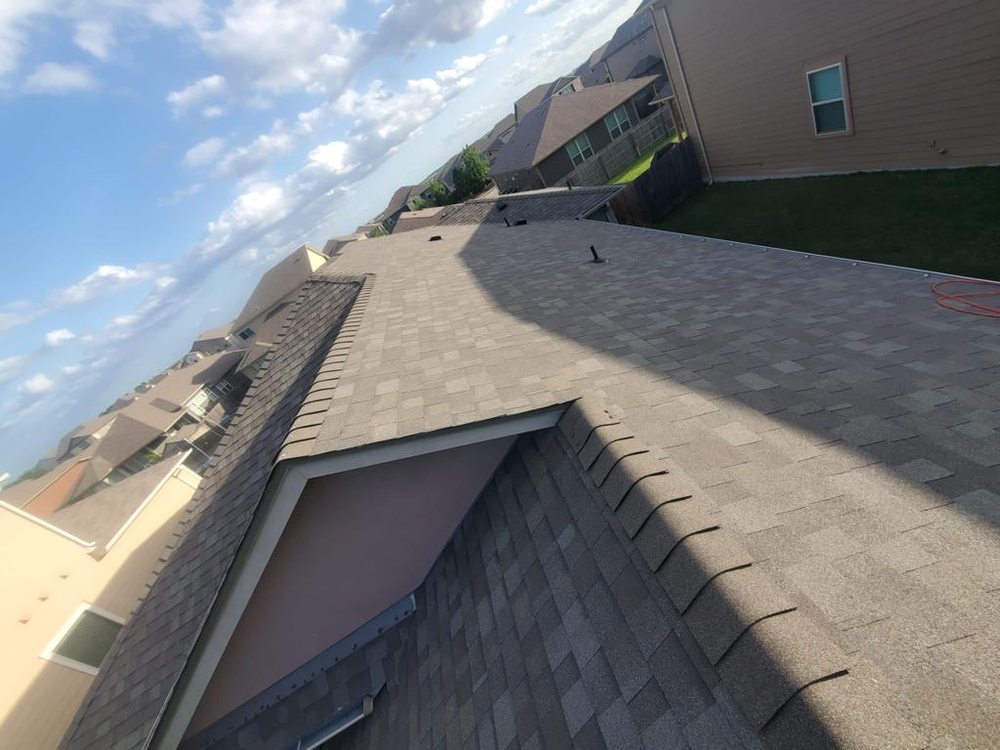 Slide of A & J Quality Roofing