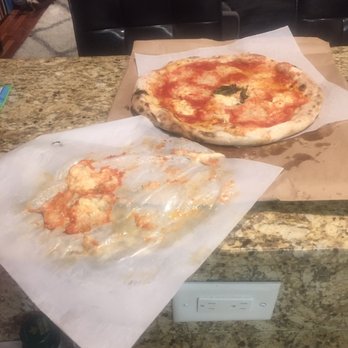 Dozzino - This is while we were still trying to save the pizza by scraping the cheese off the the paper in which it was delivered. - Pizza Near Me - Hoboken, New Jersey