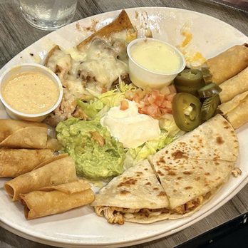 Mexcal Cantina Pacifico - This is like a sampler plate. Quesadillas and flautas and nachos with guacamole and cheese dip. Blanco queso. - Mexican Near Me - Houston, Texas Mexcal Cantina Pacifico - This is like a sampler plate. Quesadillas and flautas and nachos with guacamole and cheese dip. Blanco queso. - Mexican Near Me - Houston, Texas