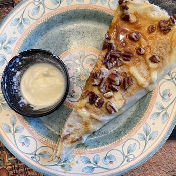 Le Petit Triangle Cafe - Half an apple butter crêpe - French Near Me - Cleveland, Ohio Le Petit Triangle Cafe - Half an apple butter crêpe - French Near Me - Cleveland, Ohio