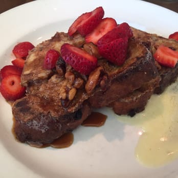Gather - Acme Walnut French Toast - two thick slices of toast covered in maple syrup, walnuts, and strawberries w/ a puddle of mascarpone - New American Near Me - Berkeley, California