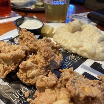 Lucky Bones Backwater Grille - Fried oyster platter with garlic mashed potatoes- hubby was in clean plate club - tasty! - Seafood Near Me - Cape May, New Jersey Lucky Bones Backwater Grille - Fried oyster platter with garlic mashed potatoes- hubby was in clean plate club - tasty! - Seafood Near Me - Cape May, New Jersey