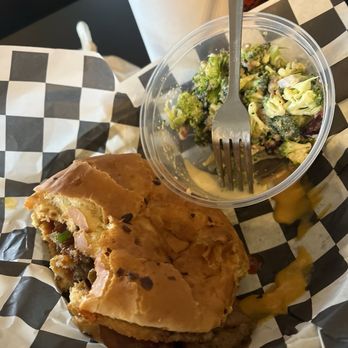 Seitan's Realm - The boss with broccoli salad. Roast beeef with a sauce and jalapeños. I don't remember what the sauce was. - Vegan Near Me - Columbus, Ohio