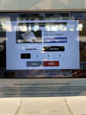 Kura Revolving Sushi Bar by null