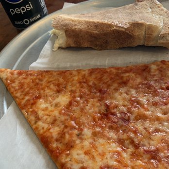 The Pizza Place - Regular slice and a white slice which I had already began lol - Pizza Near Me - Yonkers, New York The Pizza Place - Regular slice and a white slice which I had already began lol - Pizza Near Me - Yonkers, New York