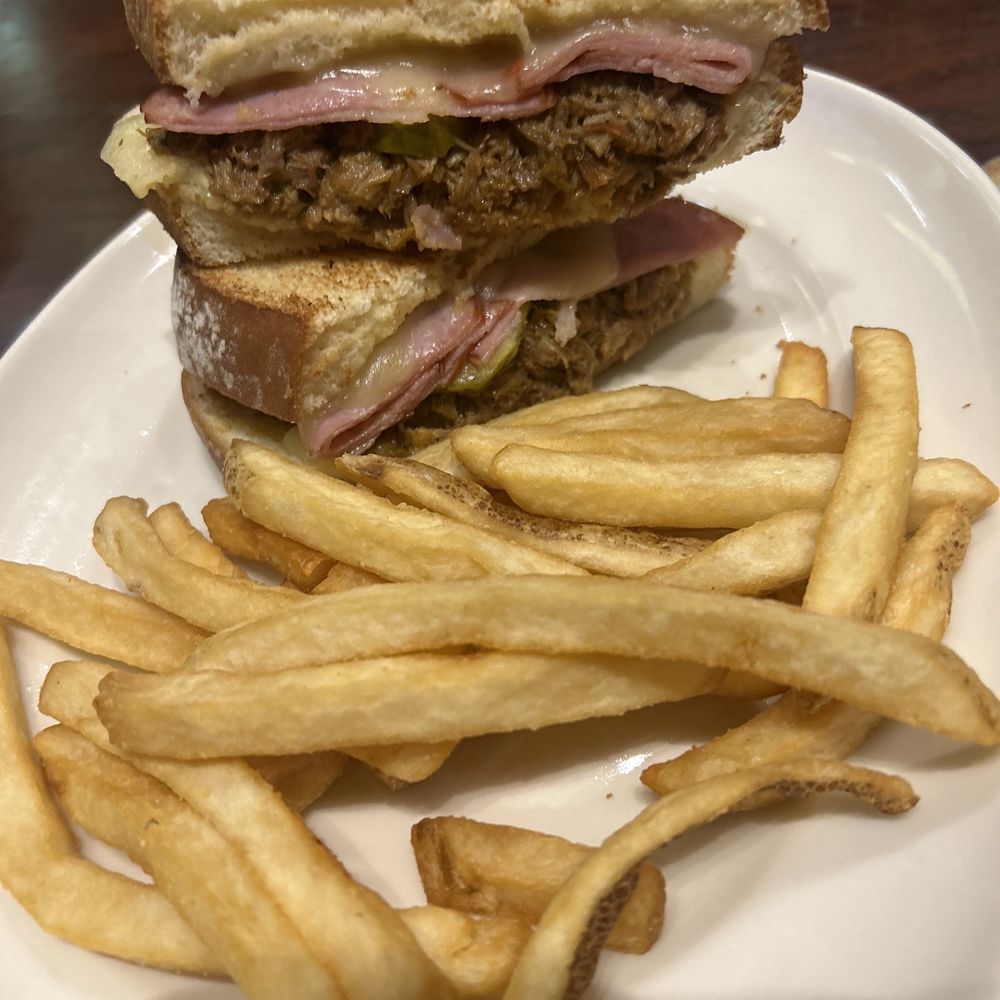 Ram Restaurant & Brewery - Cubano not even eaten. 2 pickles in it. - American Near Me - Puyallup, Washington Ram Restaurant & Brewery - Cubano not even eaten. 2 pickles in it. - American Near Me - Puyallup, Washington