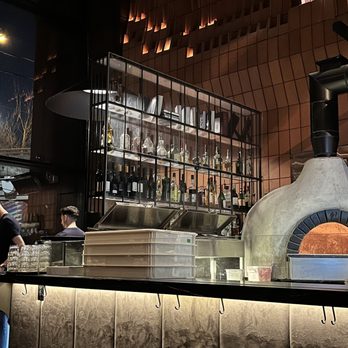 Gusto 501 - Interior: Bar and kitchen (feat. pizza oven) - Italian Near Me - Toronto, Ontario Gusto 501 - Interior: Bar and kitchen (feat. pizza oven) - Italian Near Me - Toronto, Ontario