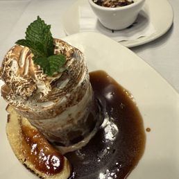 2025 Photo
Bananas Foster &
small chocolate lava cake w small scoop of vanilla ice cream. 2025 Photo
Bananas Foster &
small chocolate lava cake w small scoop of vanilla ice cream.