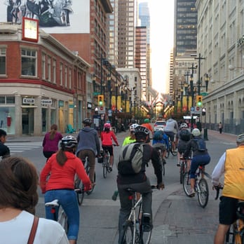 Art On Wheels! - Bike gang on its way to the next public art along the downtown cycle track network - Art Tours Near Me - Calgary, Alberta Art On Wheels! - Bike gang on its way to the next public art along the downtown cycle track network - Art Tours Near Me - Calgary, Alberta