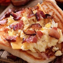 Gracie's Kitchen - Pancake breakfast taco , scrambled eggs bacon and cheese ! Or custom your combination
