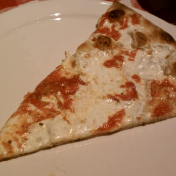 Grimaldi's Pizzeria - A slice from a large cheese pizza. - Pizza Near Me - Gilbert, Arizona Grimaldi's Pizzeria - A slice from a large cheese pizza. - Pizza Near Me - Gilbert, Arizona