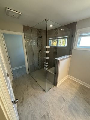 Bathroom Remodels - We are a family owned business that specializes in bathroom and kitchen remodels. Here are some photos of our latest work. Please call us for a quote today!