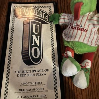 Pizzeria Uno - The Phanatic checking out the menu - Pizza Near Me - Chicago, Illinois