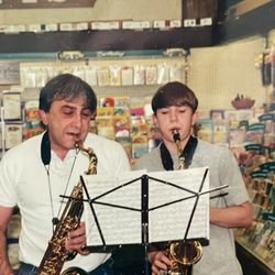 J & J Discount Pharmacy - Adam Bearden and the owner of J& J Pharmacy, play the saxophone together their favorite favorite music Glenn Miller by In The Mood .