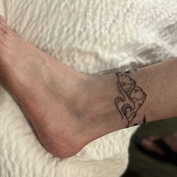 Electra Art Tattoo Studio - With mountains and waves completing the band