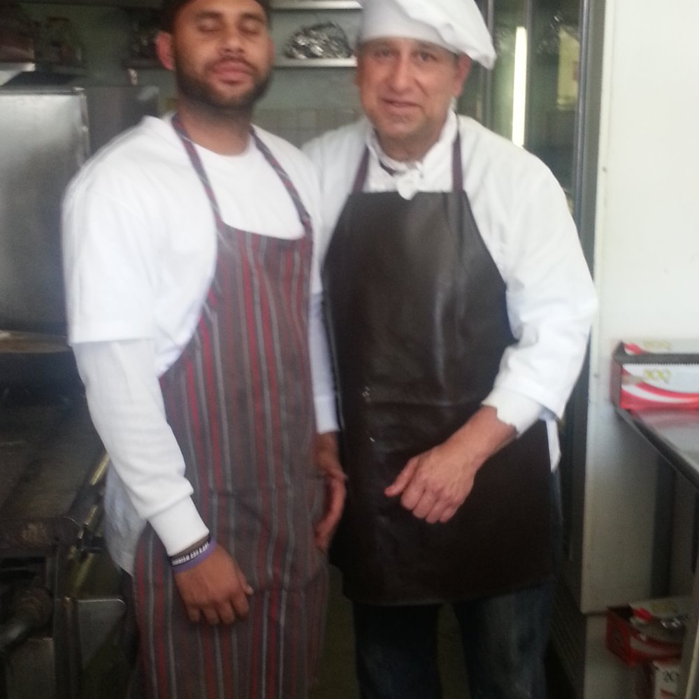 Loreto's Fried Turkey - The chefs! Father and son! - American Near Me - Compton, California Loreto's Fried Turkey - The chefs! Father and son! - American Near Me - Compton, California