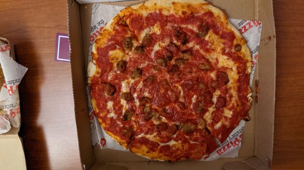 Photo of Grotto Pizza - Wilkes Barre, PA, US. 12 in regular cross cheese and sausage pizza.