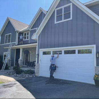 Penguin Window Cleaning - Joe cleaning garage windows. - Window Washing Near Me - Rogers, Minnesota Penguin Window Cleaning - Joe cleaning garage windows. - Window Washing Near Me - Rogers, Minnesota