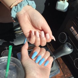 My fill (blue, no gel) was $17. My sister's regular full set (pink) was $30.