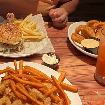 Miller's Ale House - 35 shrimp with sweet potato fries. And the prime burger - Sports Bars Near Me - Chattanooga, Tennessee
